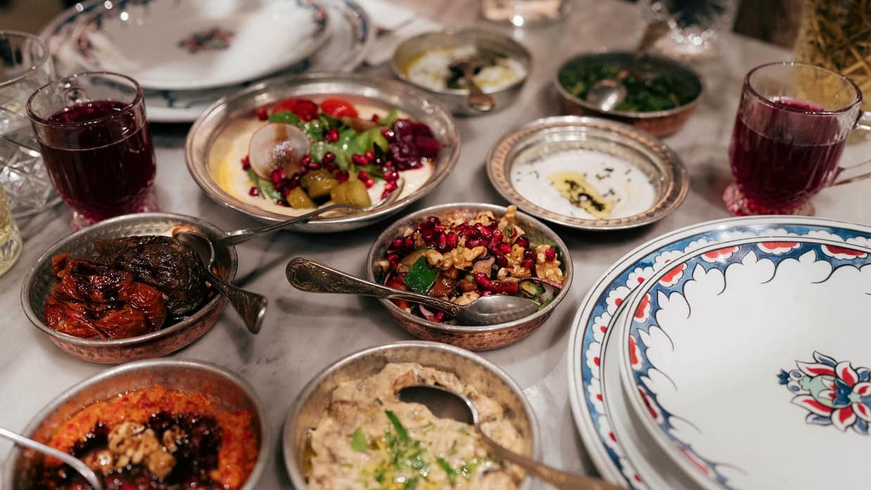 A traditional Turkish meal with various dishes and beverages in Istanbul, Türkiye. Culinary & Food Experiences. Food & Cuisine
