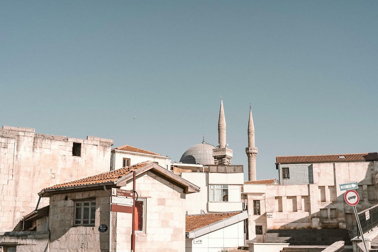 View of traditional architecture and mosque in Gaziantep, showcasing Turkish urban charm.